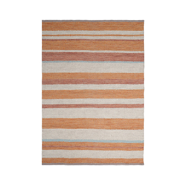 Orange kilim rug styled in modern living room