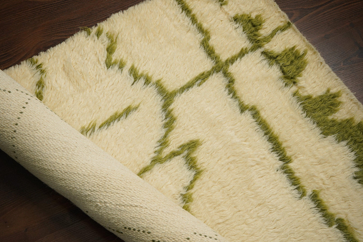 Close-up of hand-knotted tribal pattern texture
