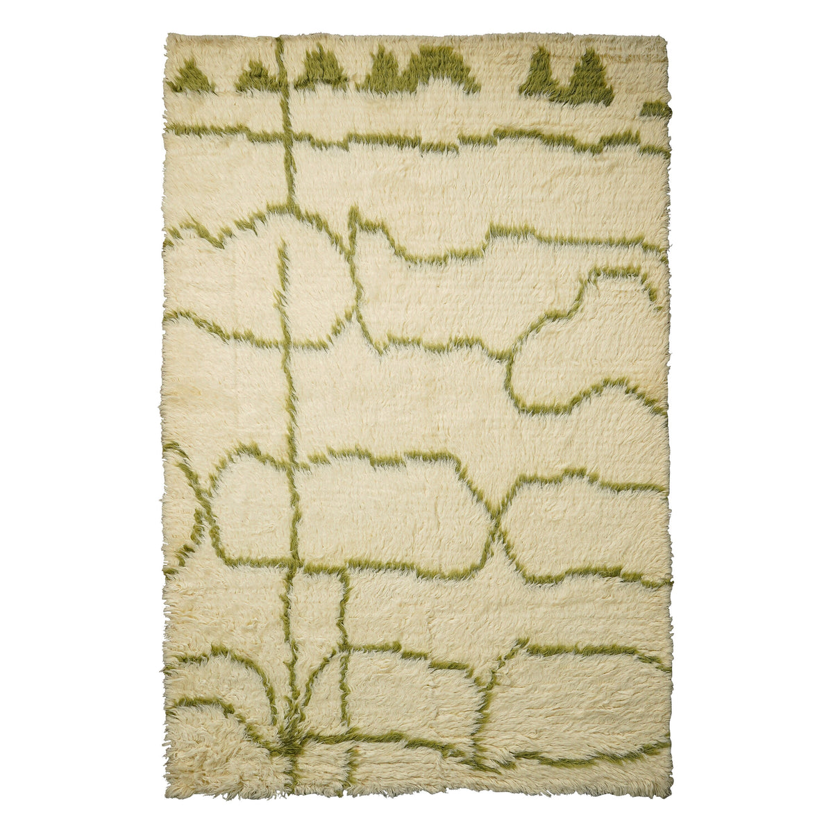 Green wool rug styled in a bohemian living room