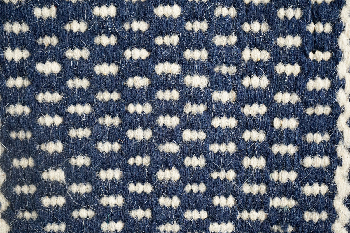 Blue wool rug edge detail