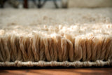 Close-up of hand-knotted shag pile texture