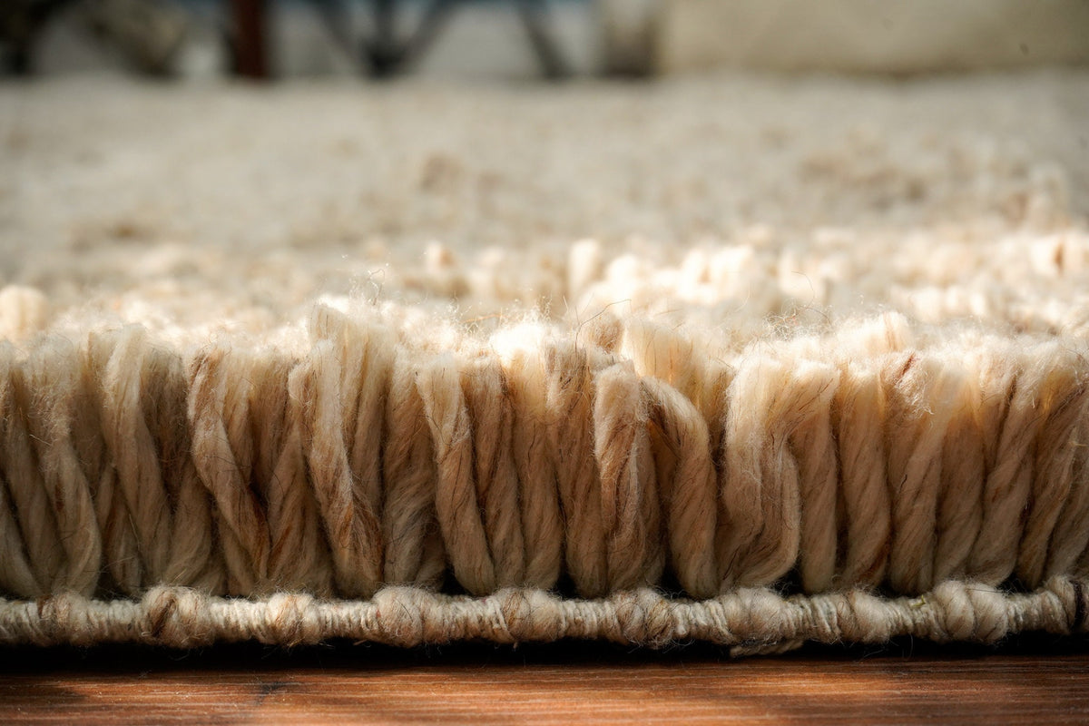 Close-up of hand-knotted shag pile texture