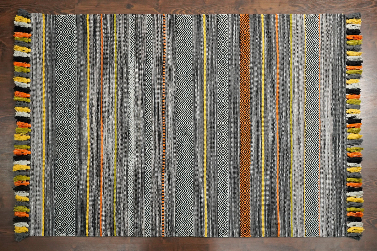 Overhead view of grey striped cotton rug