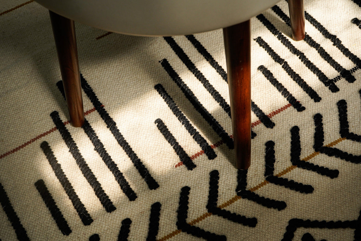Moroccan style ivory rug corner detail