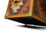 Kilim trunk box corner detail showing leather trim