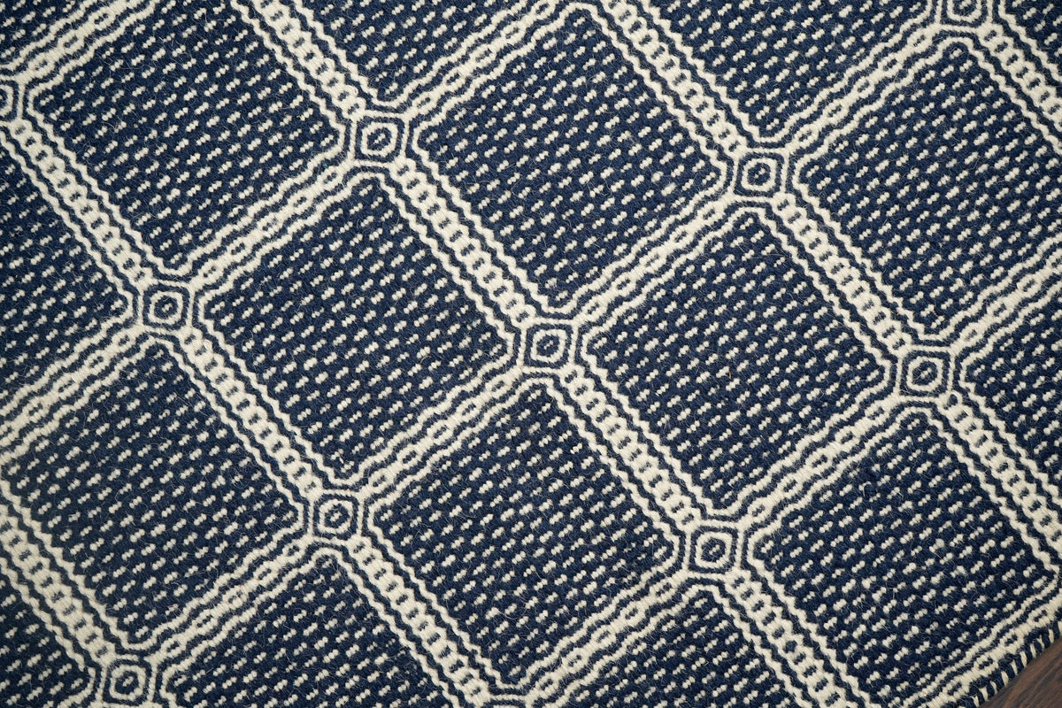 Blue wool rug corner detail