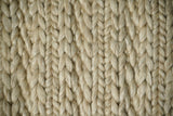 Ribbed knit ivory cream wool rug flat view