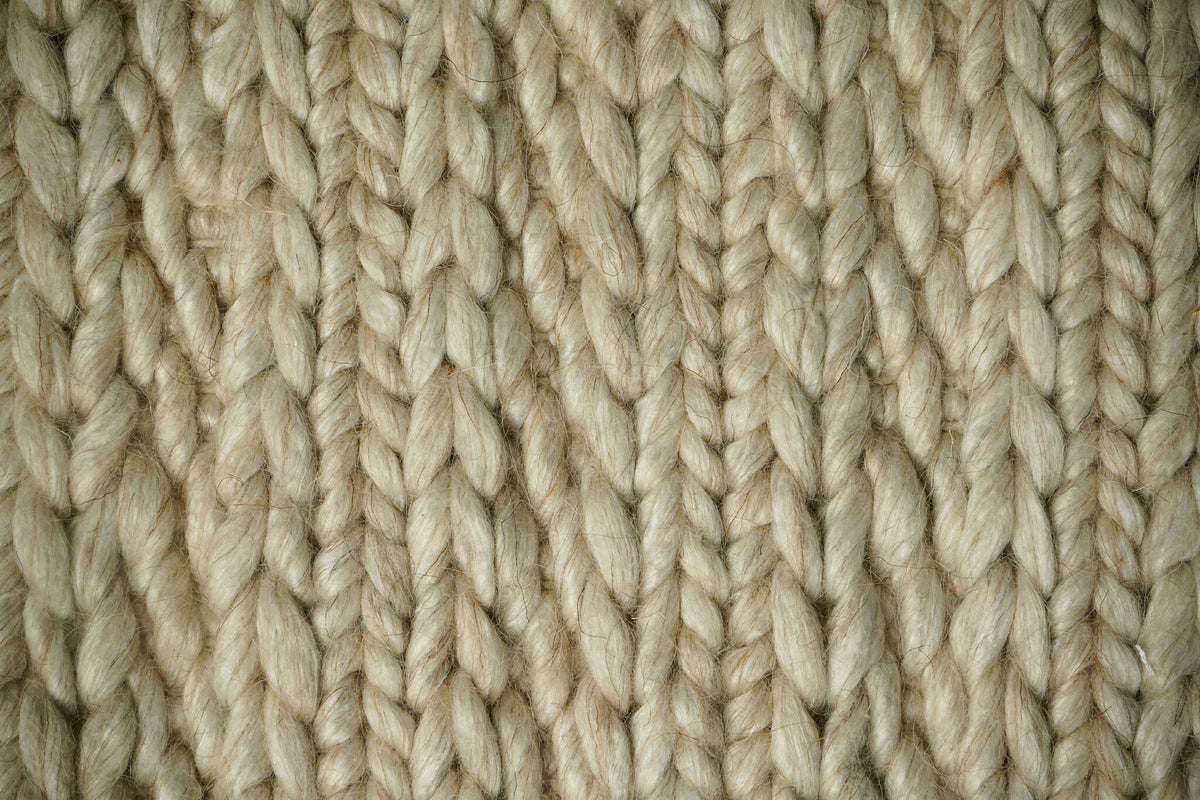 Ribbed knit ivory cream wool rug flat view