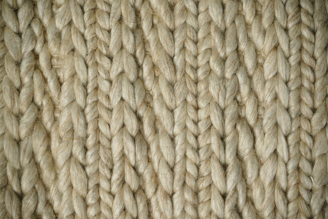 Ribbed knit ivory cream wool rug flat view