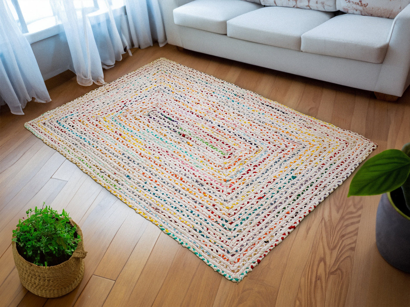 Rainbow chindi rag rug laid flat showing full striped pattern