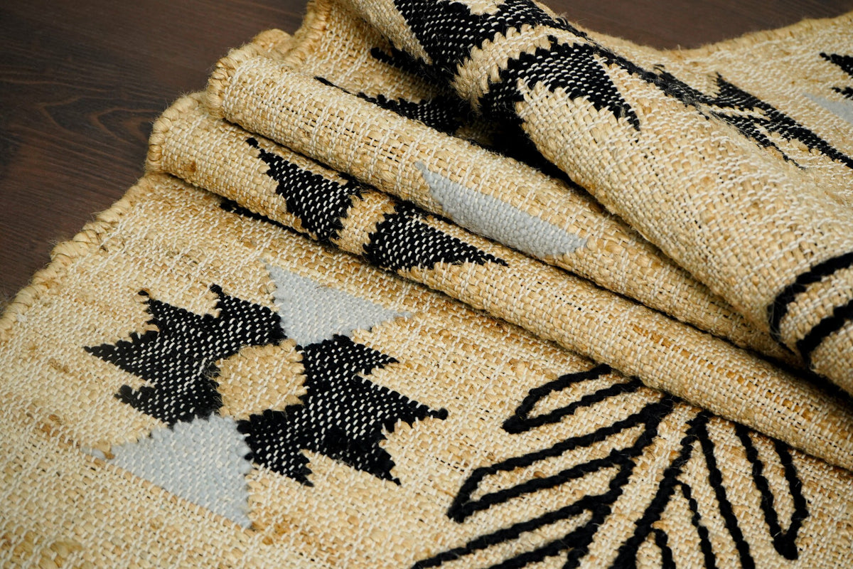 Jute rug styled near a sofa and coffee table