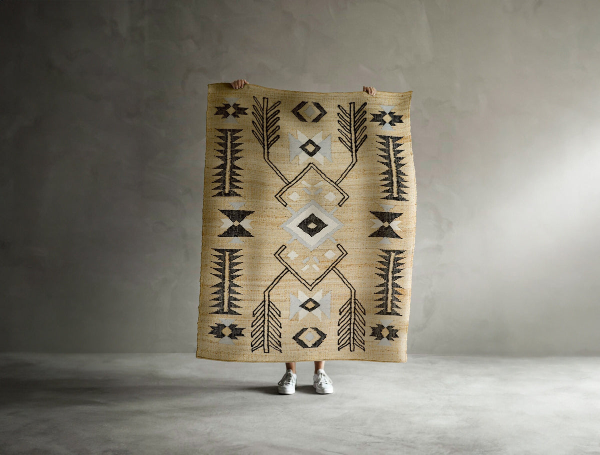 Jute geometric rug styled in a living room setting