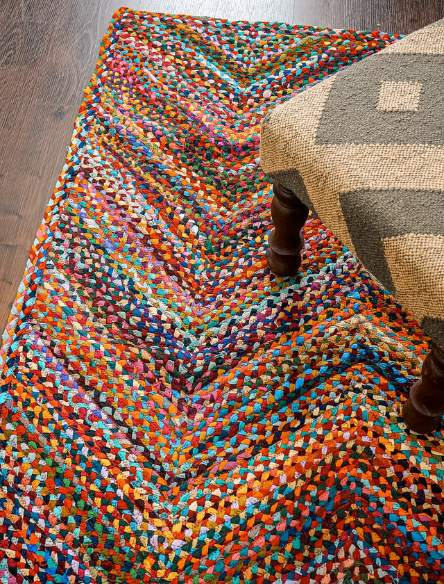 Colourful rag rug styled in a living room