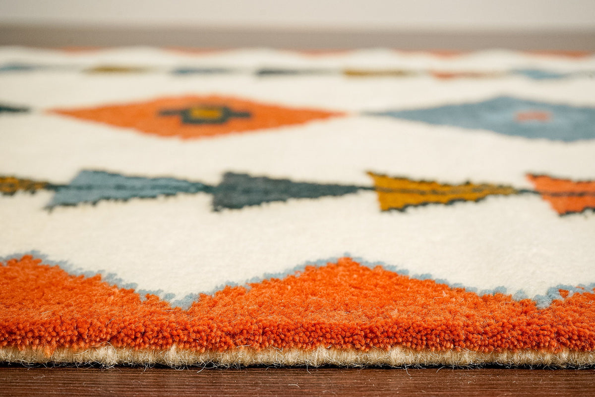 Multicolor wool rug texture close-up showing pile