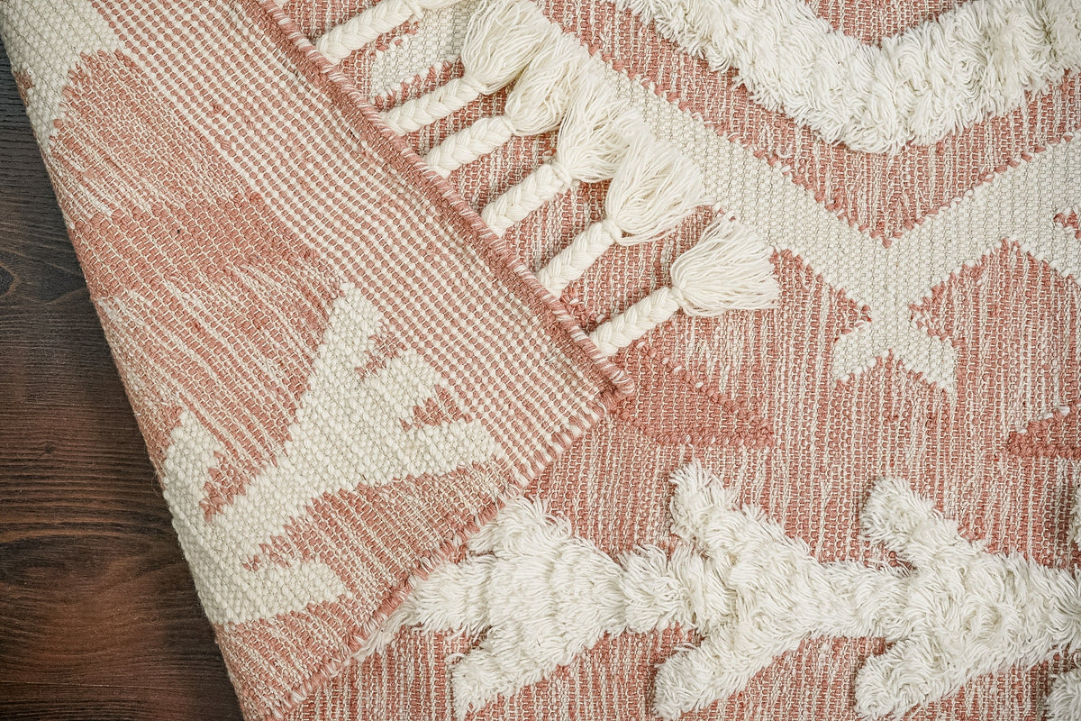 Pink Moroccan rug in natural light setting