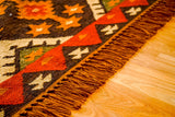 Southwestern kilim rug laid in an entryway