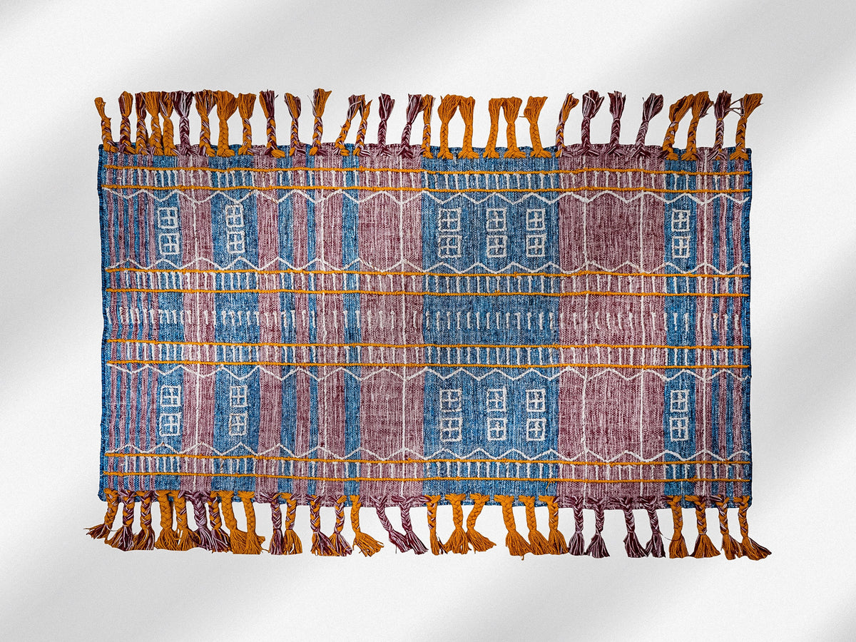 Close-up of kilim rug fringe and braided edge detail