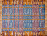 Blue-purple tribal rug corner view showing weave texture