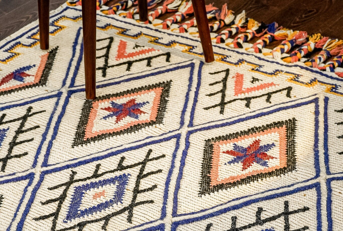 Moroccan kilim rug styled in a living room