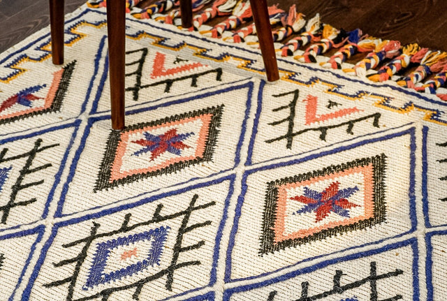Moroccan kilim rug styled in a living room