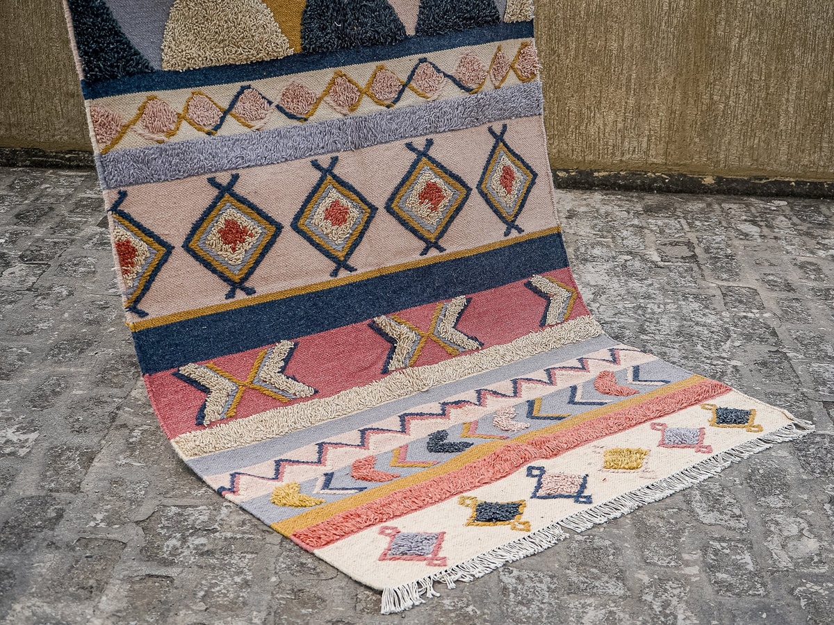 Pastel Moroccan rug fringe detail close-up