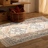 Pink vintage kilim rug laid flat showing full pattern