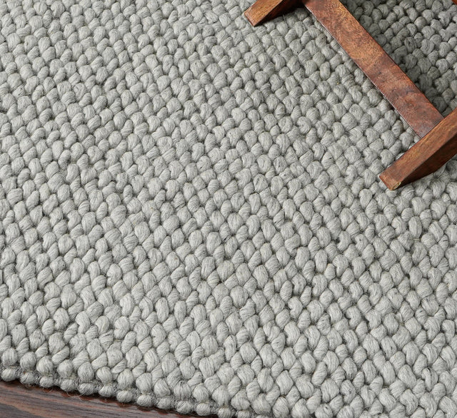 Cashew loop wool rug styled in a modern living room