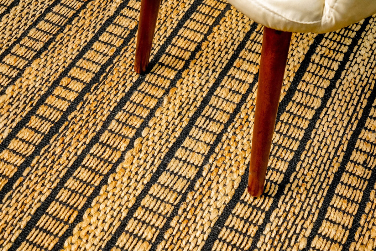Natural ribbed striped jute rug, flat lay view