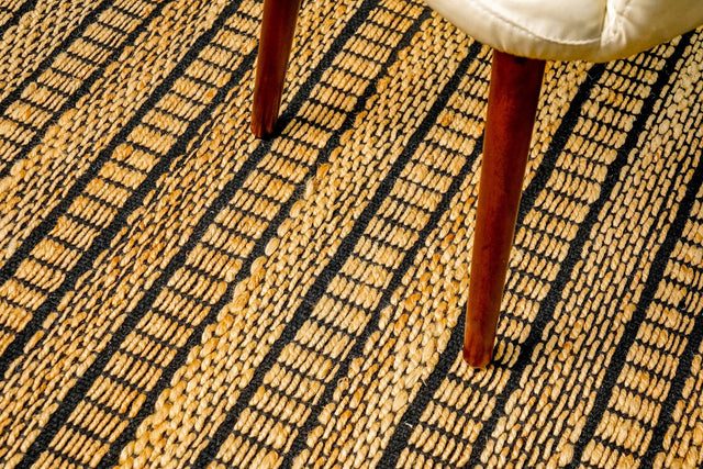 Natural ribbed striped jute rug, flat lay view