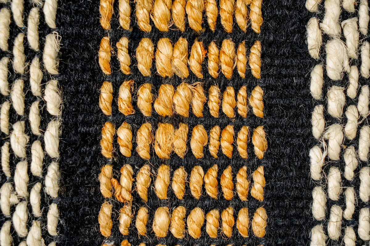 Jute rug edge detail showing texture
