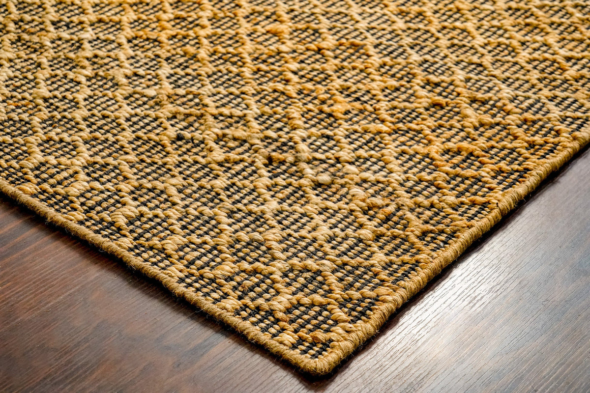 Honeycomb jute rug styled with furniture in room
