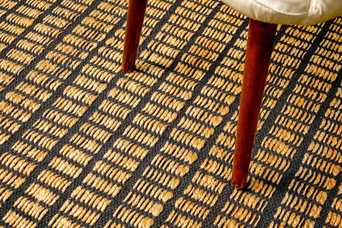 Natural gridwork geometric jute area rug, flat lay view