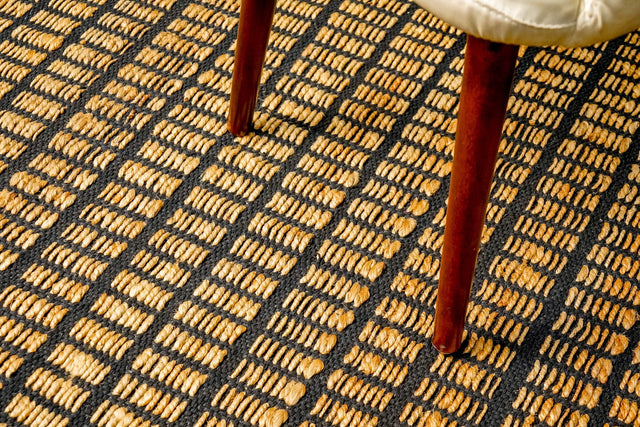 Natural gridwork geometric jute area rug, flat lay view