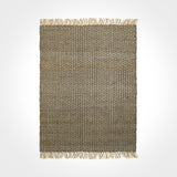 Grey jute rug styled in a farmhouse-style room