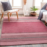 Close-up of cotton chenille weave on pink kilim rug
