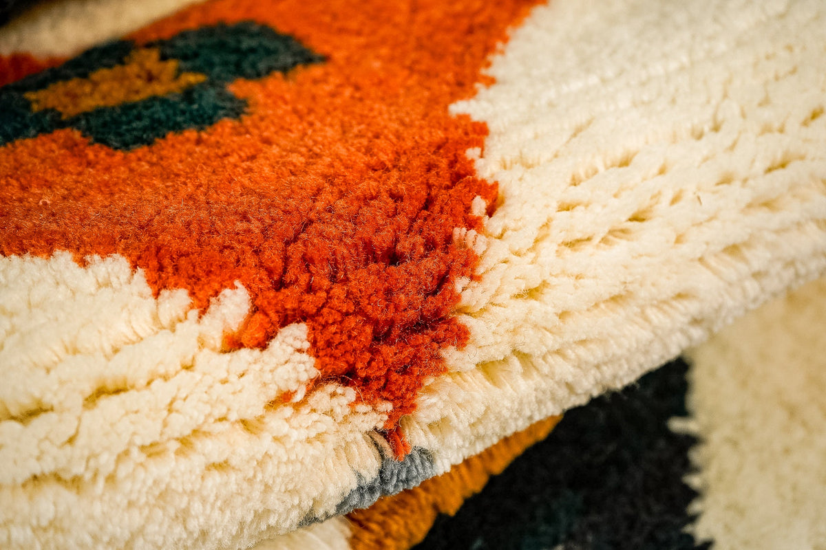 Multicolor wool rug under a coffee table