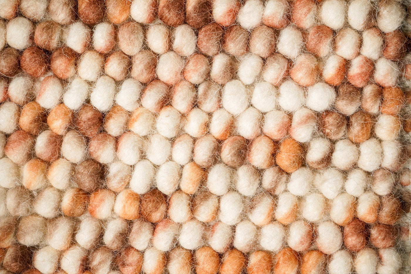 Blended brown chunky looped wool rug, flat lay view