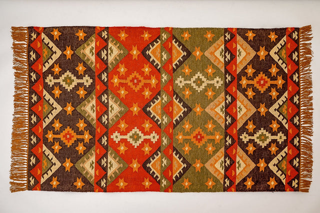 Southwestern kilim rug styled in a living room setting
