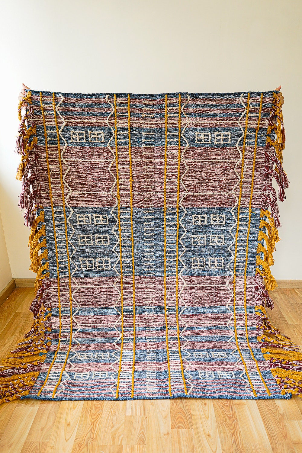 Tribal pattern detail on blue-purple PET yarn kilim rug