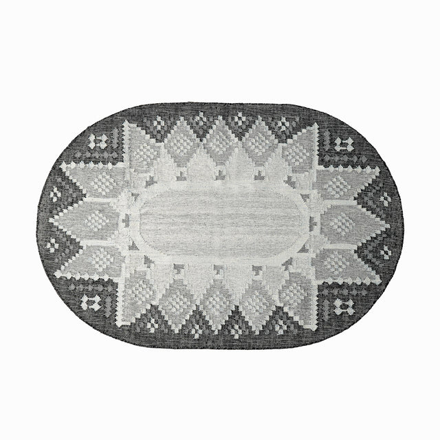 Gray outdoor kilim oval rug, flat lay view
