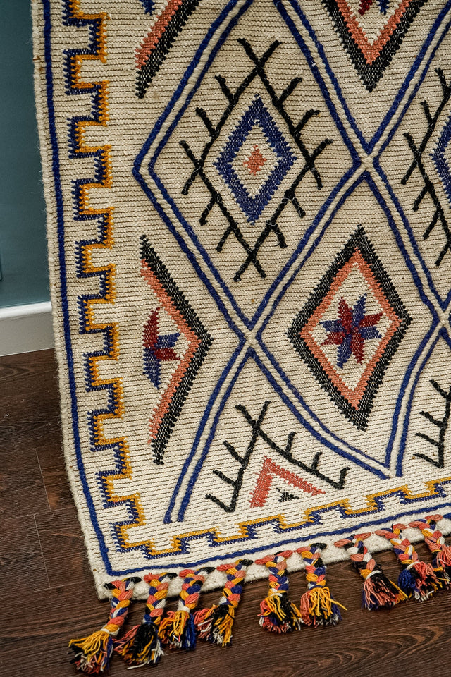 Colourful Moroccan kilim wool rug flat lay