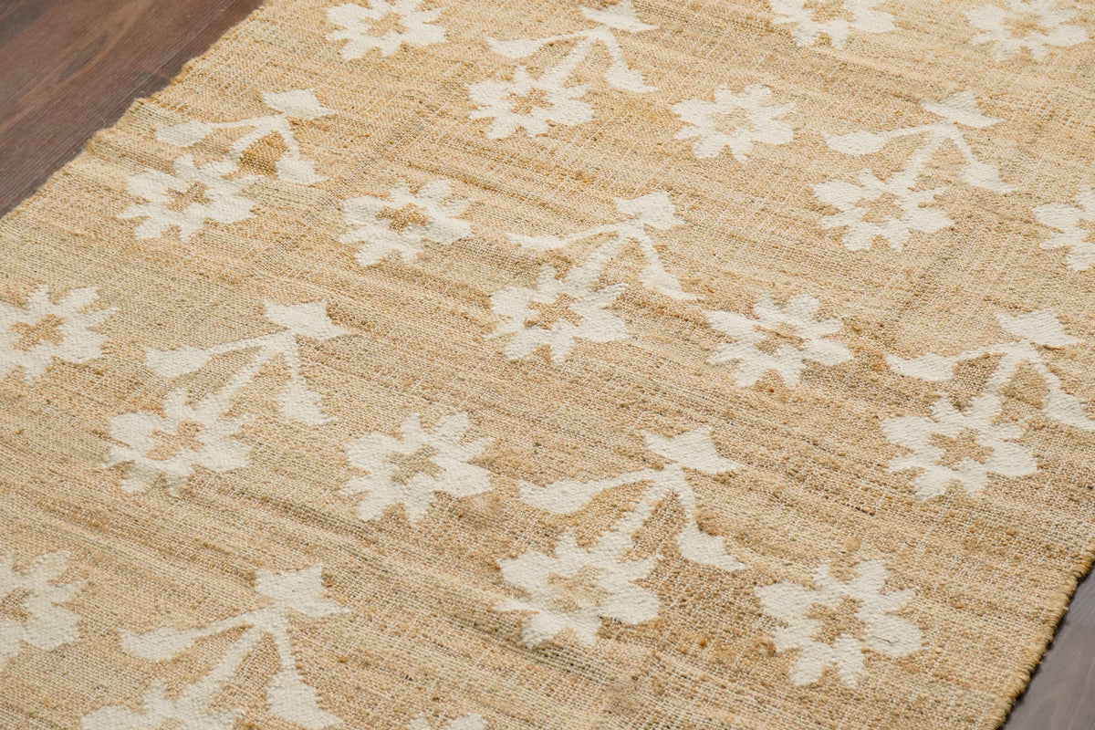 Jute area rug under a coffee table