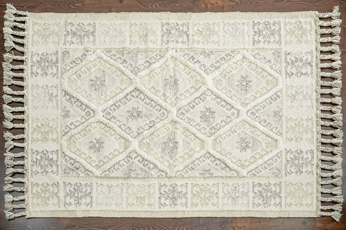 Wide shot of white Moroccan rug in a bright room