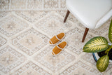 White kilim rug styled in a bright living room