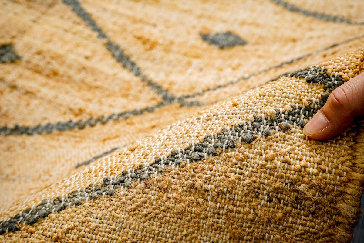 Jute area rug under a coffee table