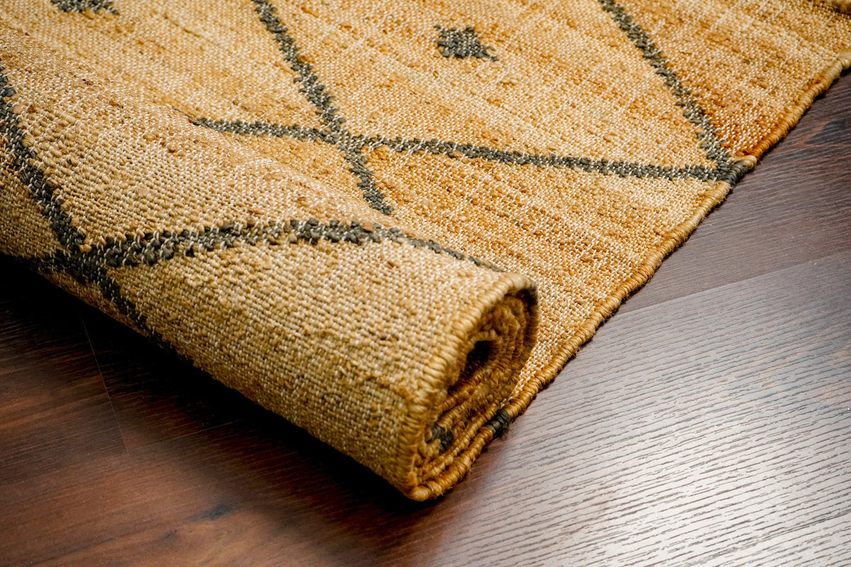 Diamond lattice jute rug in a boho-styled room