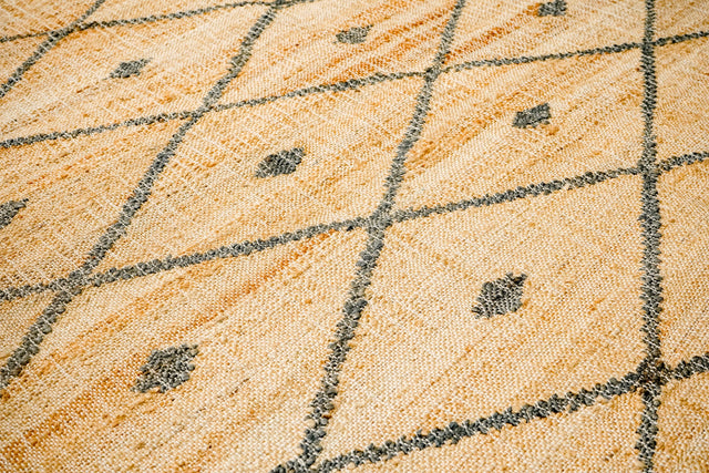 Jute diamond rug styled in a modern living room