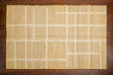 Jute area rug in an entryway setting