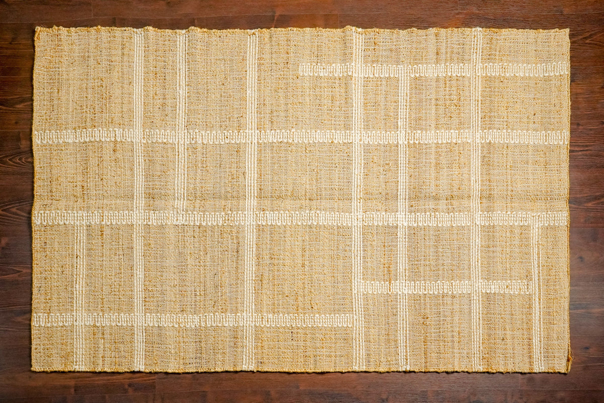 Jute area rug in an entryway setting