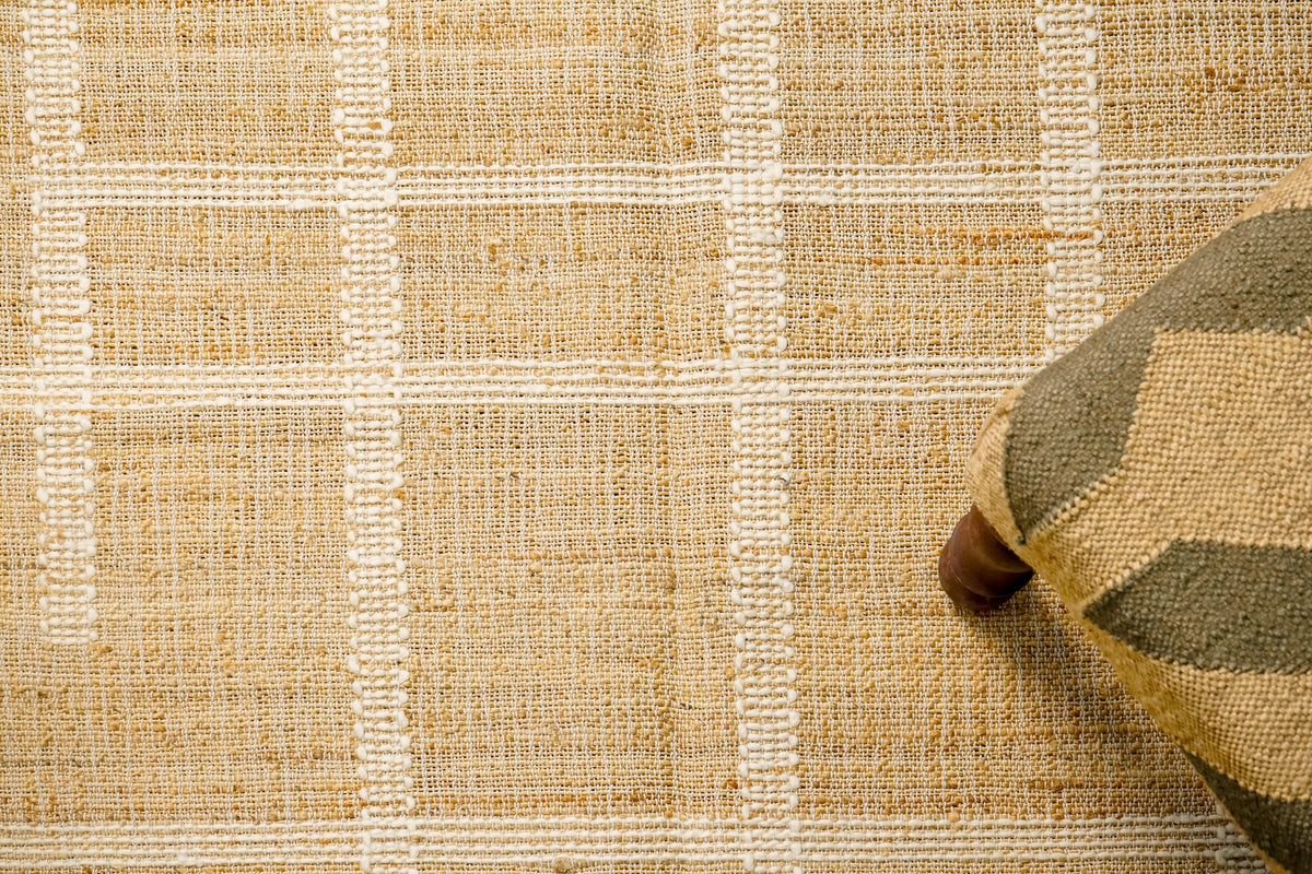 Close-up of jute rug weave and white stripe detail